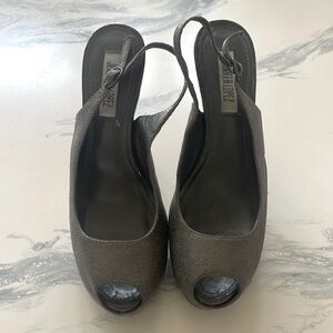Jennifer Lopez peep toe sling backs. Only worn a few times.
